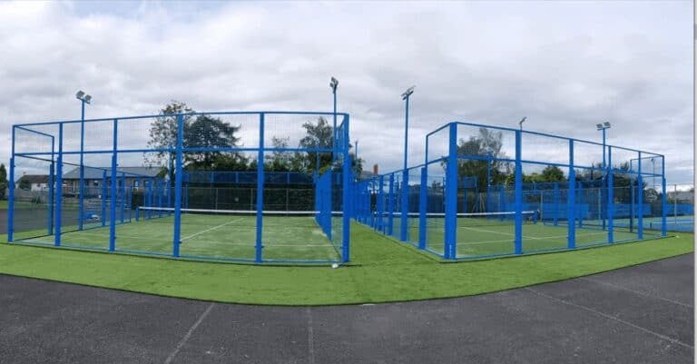 Hereford Squash Tennis & Racketball Centre – outdoor padel courts with blue frames and green playing surface at a community sports venue in Herefordshire