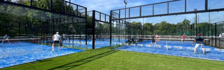 Rocks Lane – Barnes - showing outdoor courts with people actively playing, highlighting the club’s lively atmosphere and community-focused racquet sport facilities in Barnes, South West London.