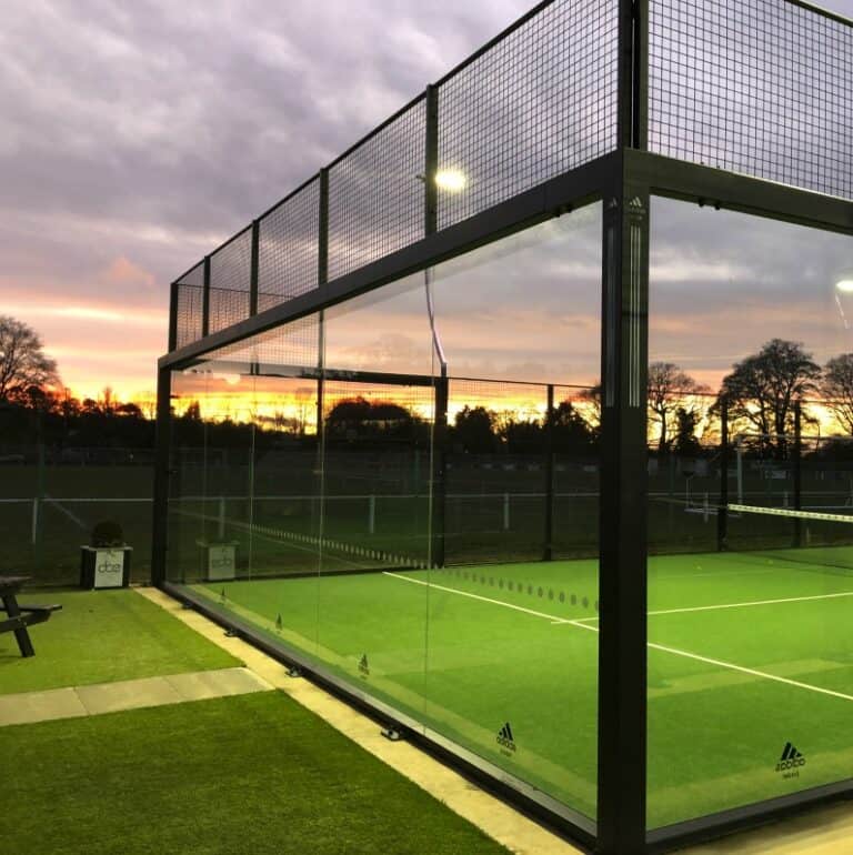 Outdoor padel court at Thistle Padel Club – Game4Padel facility featuring vibrant court colours and clear skies in a scenic outdoor setting.