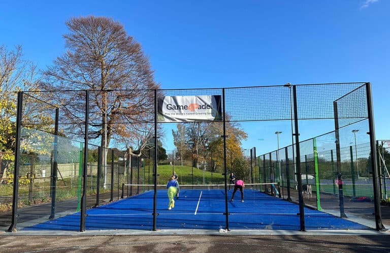 People playing padel on outdoor courts at Withdean Sports Complex (Game4Padel) – vibrant community sports venue in Brighton, UK.