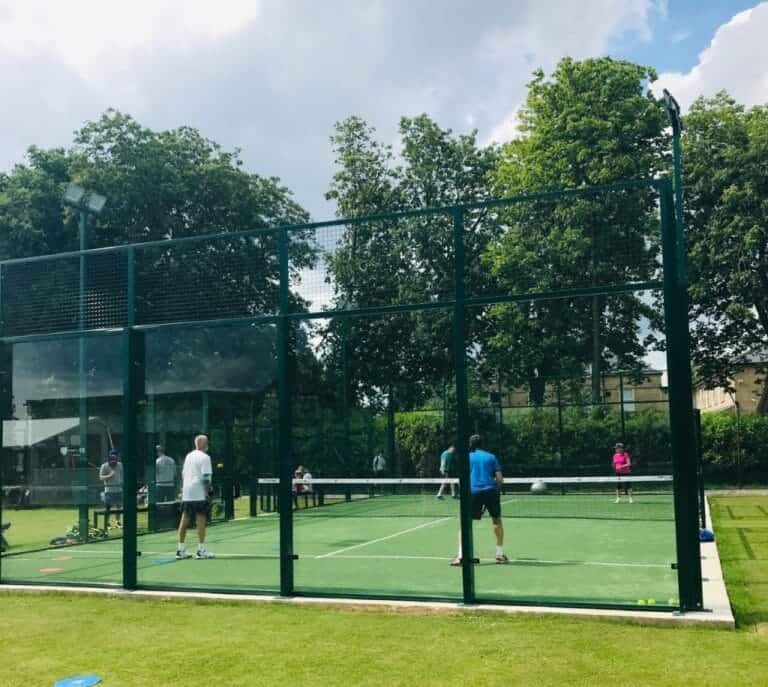 Padel at Rawdon Golf, Lawn Tennis & Padel Club Image 1 showing a modern outdoor padel court in a green, leafy setting, highlighting the club’s multi-sport offering and growing padel community near Leeds, West Yorkshire.