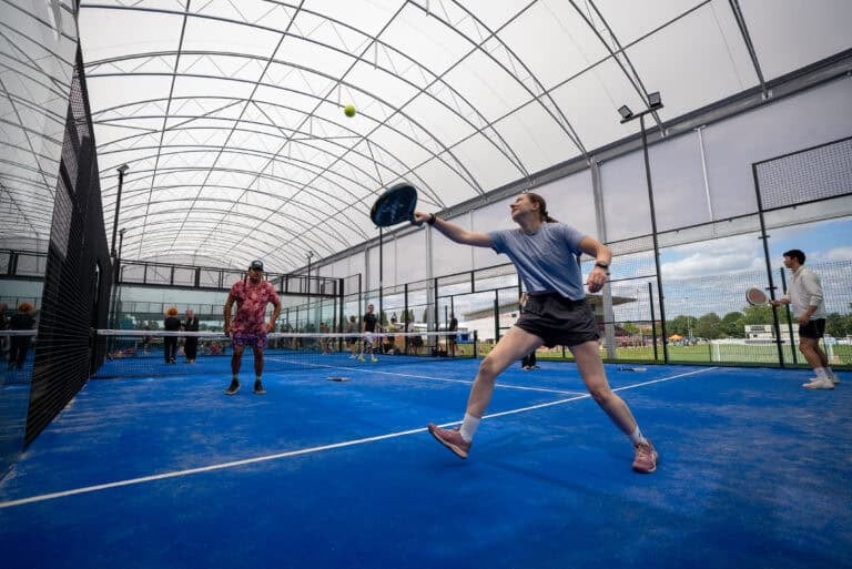 Players in action during a padel match at Connect Padel Birmingham.
